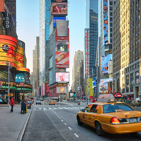 Be dazzled by the bright lights of Times Square, a thirty-minute walk or ten-minute car ride away