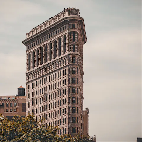 Visit the distinctive Flatiron Building, a twenty-five-minute stroll from your building