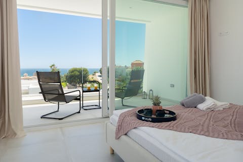 Wake up and head out onto the main bedroom's balcony for a coffee first thing