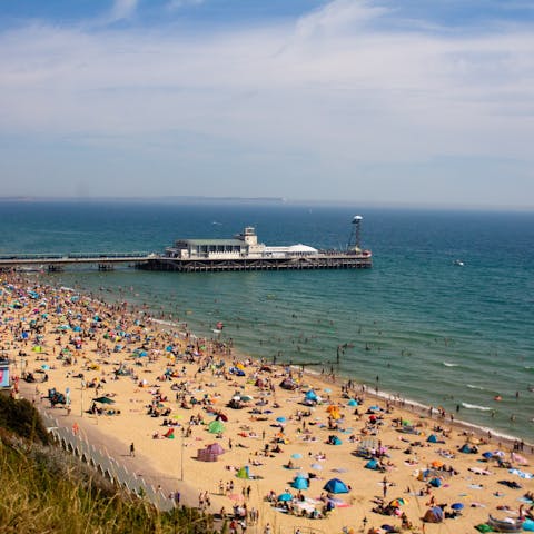 Spend leisurely days on Bournemouth Beach, a five-minute drive away