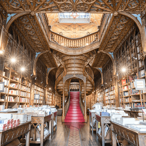 Explore the packed shelves of the Lello bookstore