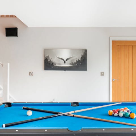 Show off your potting prowess on the pool table