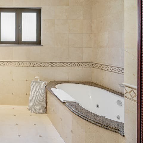 End the day with a soak in the master's Jacuzzi tub