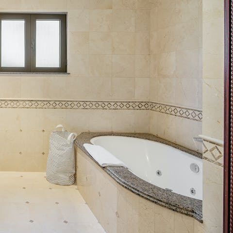 End the day with a soak in the master's Jacuzzi tub