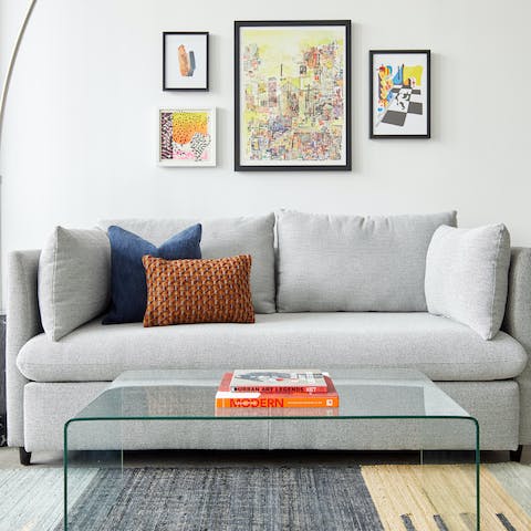 Kick back in the artsy living room with a good book and a glass of wine after a busy day of sightseeing