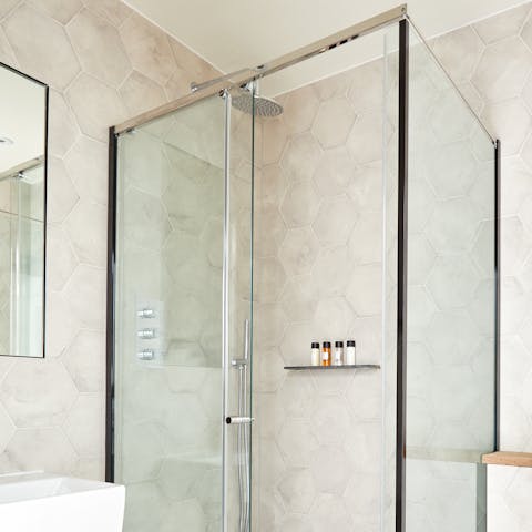 Enjoy a long, hot shower from your luxurious rain shower after a long day of exploring the city or working