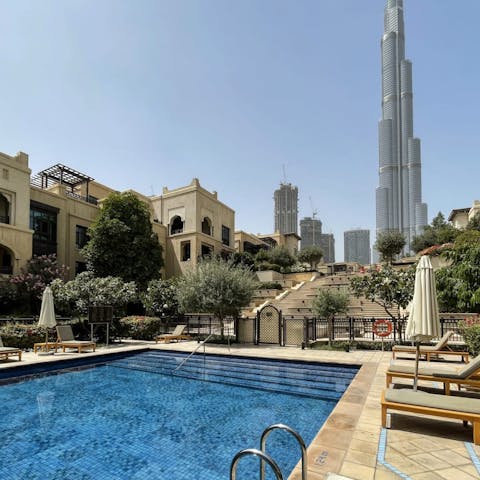 Spend blissful days relaxing by the pool, taking in the views of the Burj Khalifa, and occasionally taking dips to cool off