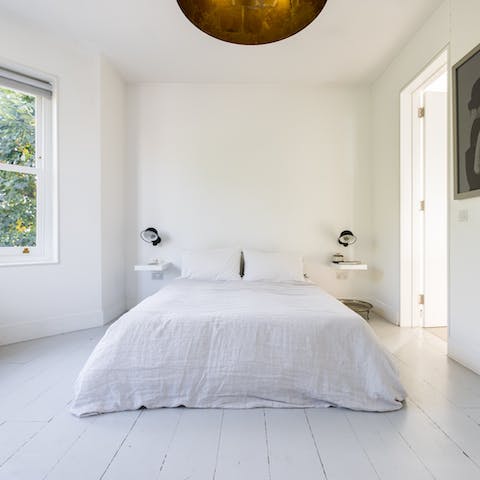 Wake up to views over Highbury Fields from the minimalist master bedroom