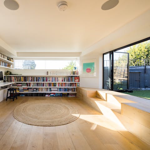 Soak up the sun in the rooftop study, with its collection of books and in-built speakers