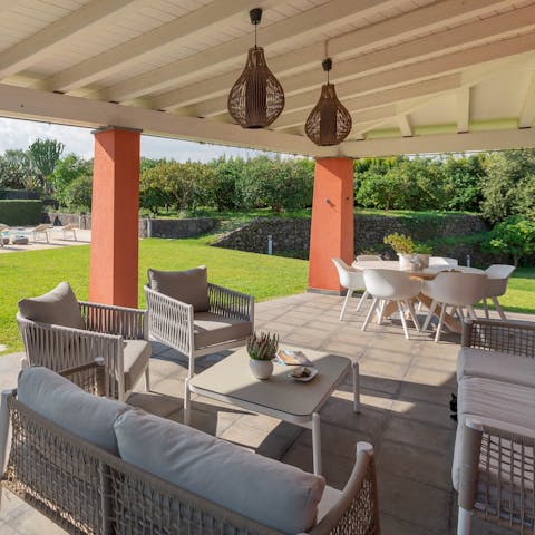 Recline on the outdoor sofas or gather for drinks on covered pool-view terrace