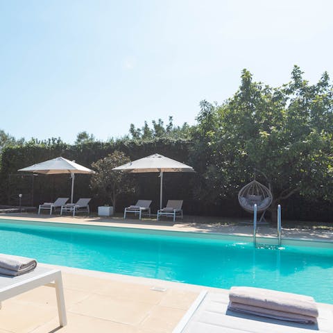 Laze on loungers in the sun or shade before cooling off with a refreshing dip in the outdoor pool