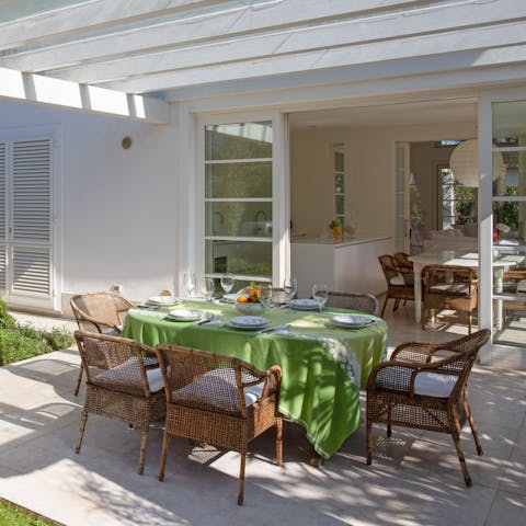 Wine and dine alfresco under the pergola on balmy summer evenings