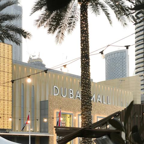 Browse the designer shops at the Dubai Mall nearby