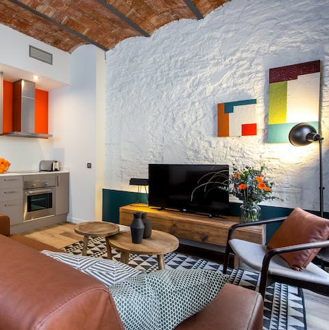 Cosy up in the stylish living space with traditional Catalan touches
