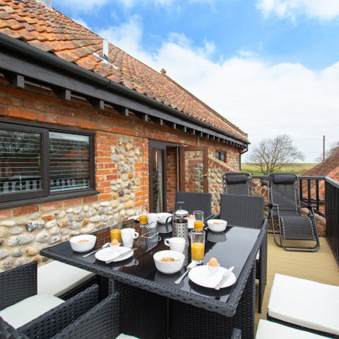 Enjoy an alfresco breakfast on the balcony