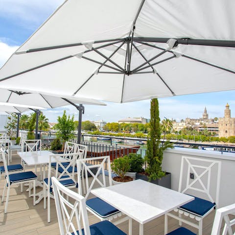 Sit down for a light snack on the communal roof terrace