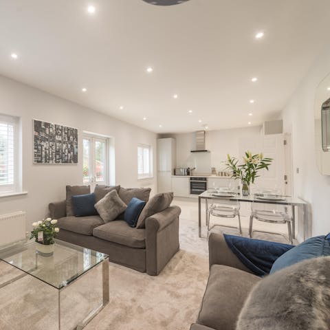 Kick back and relax in the stylish living room after a day of Ascot sightseeing, a glass of wine in hand