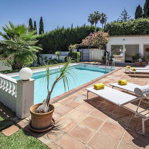 Sit back and relax on a sun lounger, or cool off in the private pool
