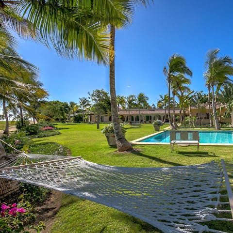 Let the soft ocean air lull you to sleep as you sway gently in the hammock outside