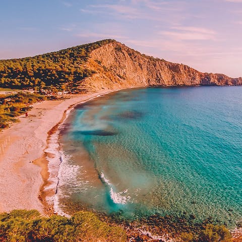 Soak up the glorious sunshine on Godola Beach, a short drive away