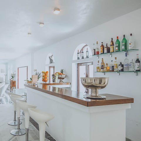 Show off your mixologist skills at the bar in your living space
