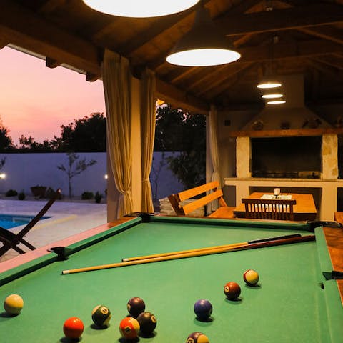 Spend your evenings sipping cold beer and playing pool