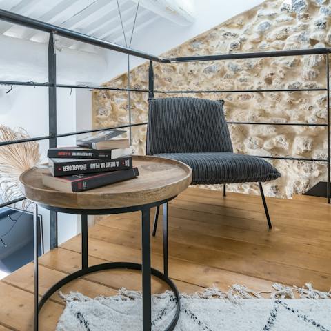 Head up to the mezzanine level to find the little reading nook