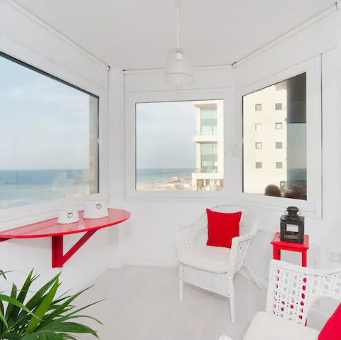 Admire the beautiful coastal vista from the home's large windows