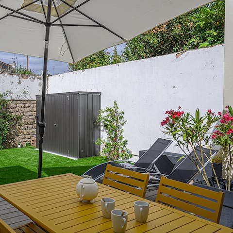 Step outside and enjoy the tranquillity of the terrace and garden