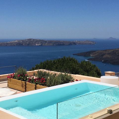 Enjoy a relaxing soak in the private jacuzzi while taking in the vistas