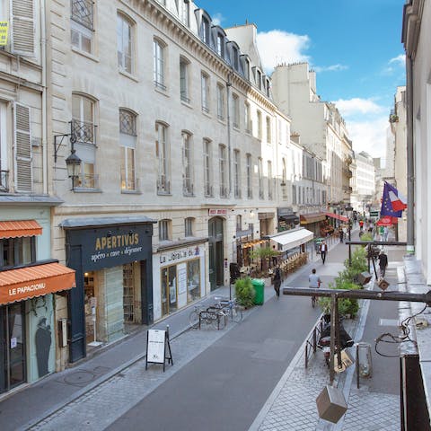 Stay on a charming street lined with cafes, shops and restaurants, right in the heart of Paris