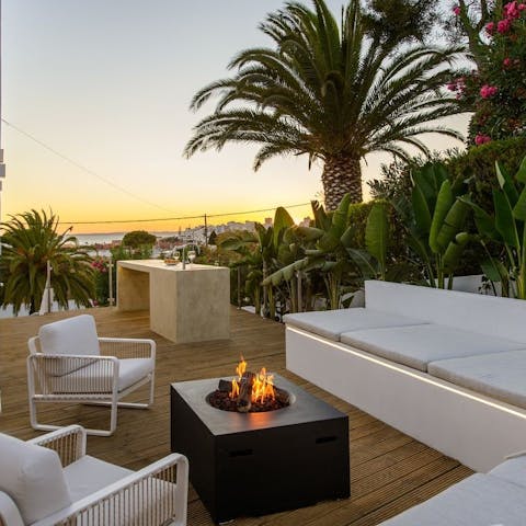 Catch the sunset from around the fire pit 