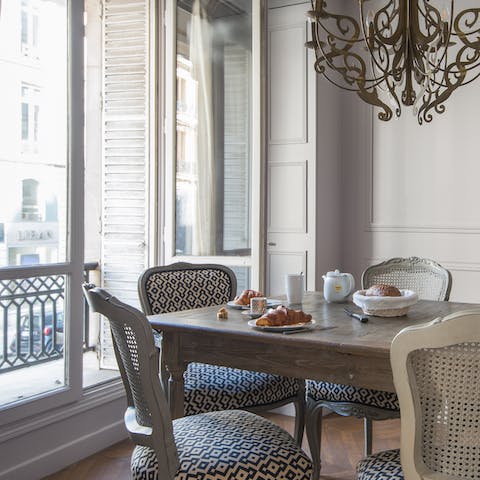Enjoy fresh coffee and croissants by the window each morning