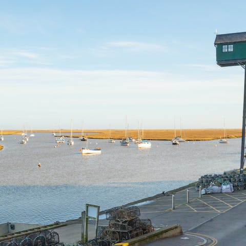 Admire uninterrupted harbour and salt marsh views from the living room's windows and Juliet balcony