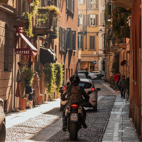 Explore Milan's pretty streets to happen upon cosy bars and traditional restaurants