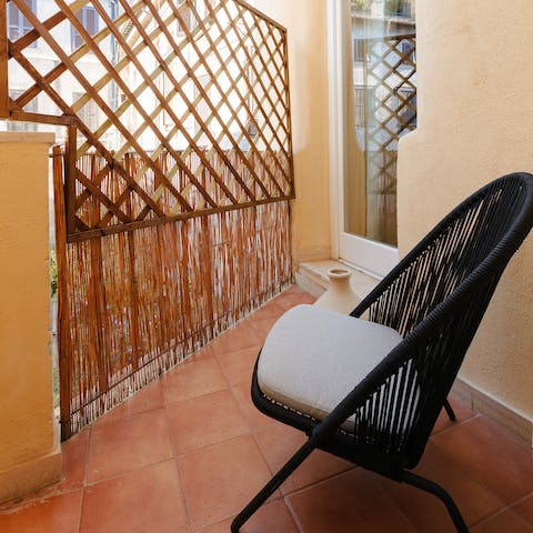 Enjoy your morning espresso on the private balcony