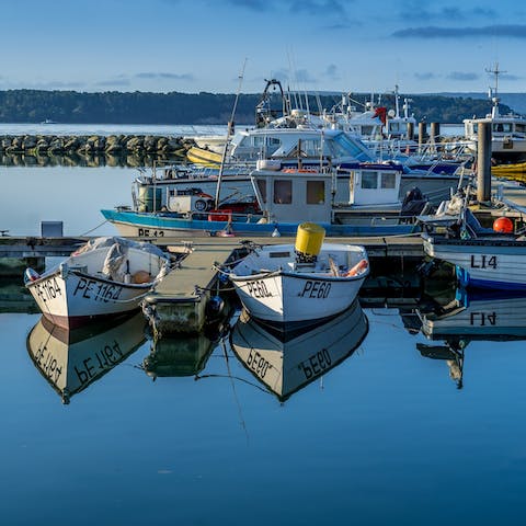 Explore Poole's beautiful quayside and old town, a seven-minute drive away