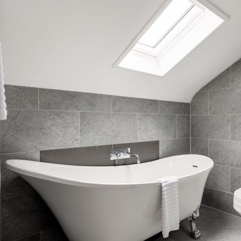 Relax and unwind with a soak in the roll top bath tub