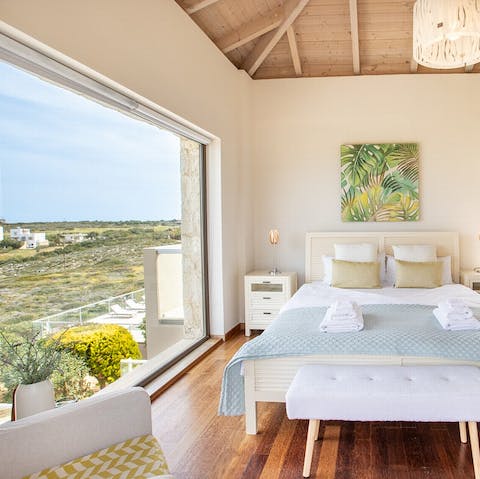 Wake up to stunning views of the Aegean Sea from the big bedroom windows