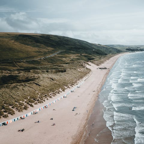Experience sun, sea and surf down at the idyllic Woolacombe Beach,  approximately fifteen minutes away