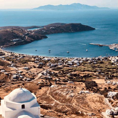 Watch boats and yachts sail into Livadi harbour – it's a six-minute drive