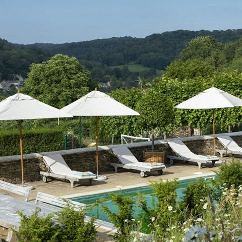 Soak up the sun from in or beside the heated pool