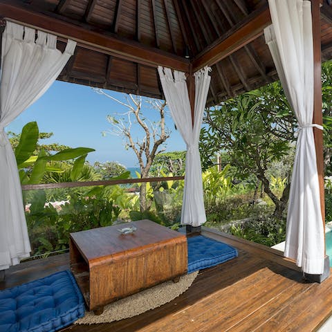 Book in for a private massage from the villa's veranda with a glimpse of the sea