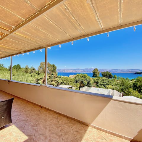 Gaze out over a picturesque coastal vista from the first-floor balcony