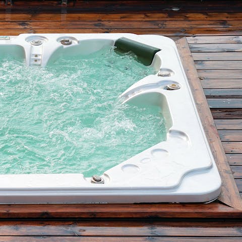 Soak slope-weary legs in the private hot tub outside