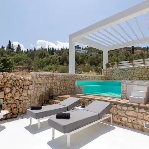 Soak up the Greek sunshine and cool off in the private plunge pool