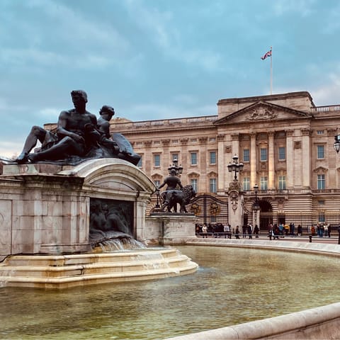 Catch a double-decker down to the majestic Buckingham Palace