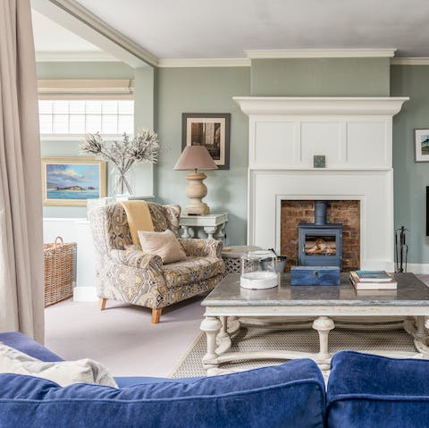 Hunker down in the drawing room for movie nights – there’s a log burner fire and sky at the ready