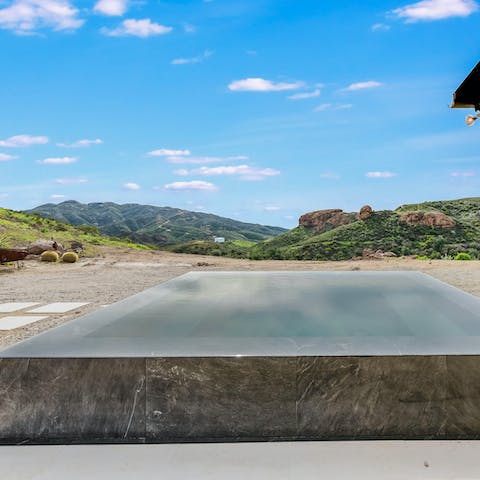 Unwind in the marble hot tub and drink in those Santa Monica Mountain views