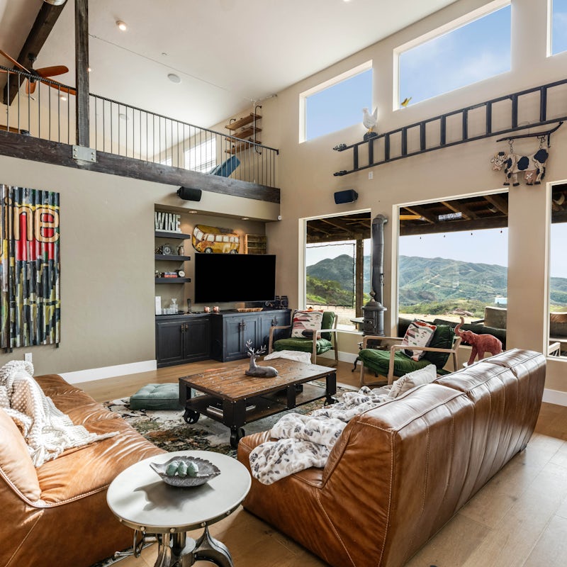 Enjoy the 19-foot ceilings in this open barn house